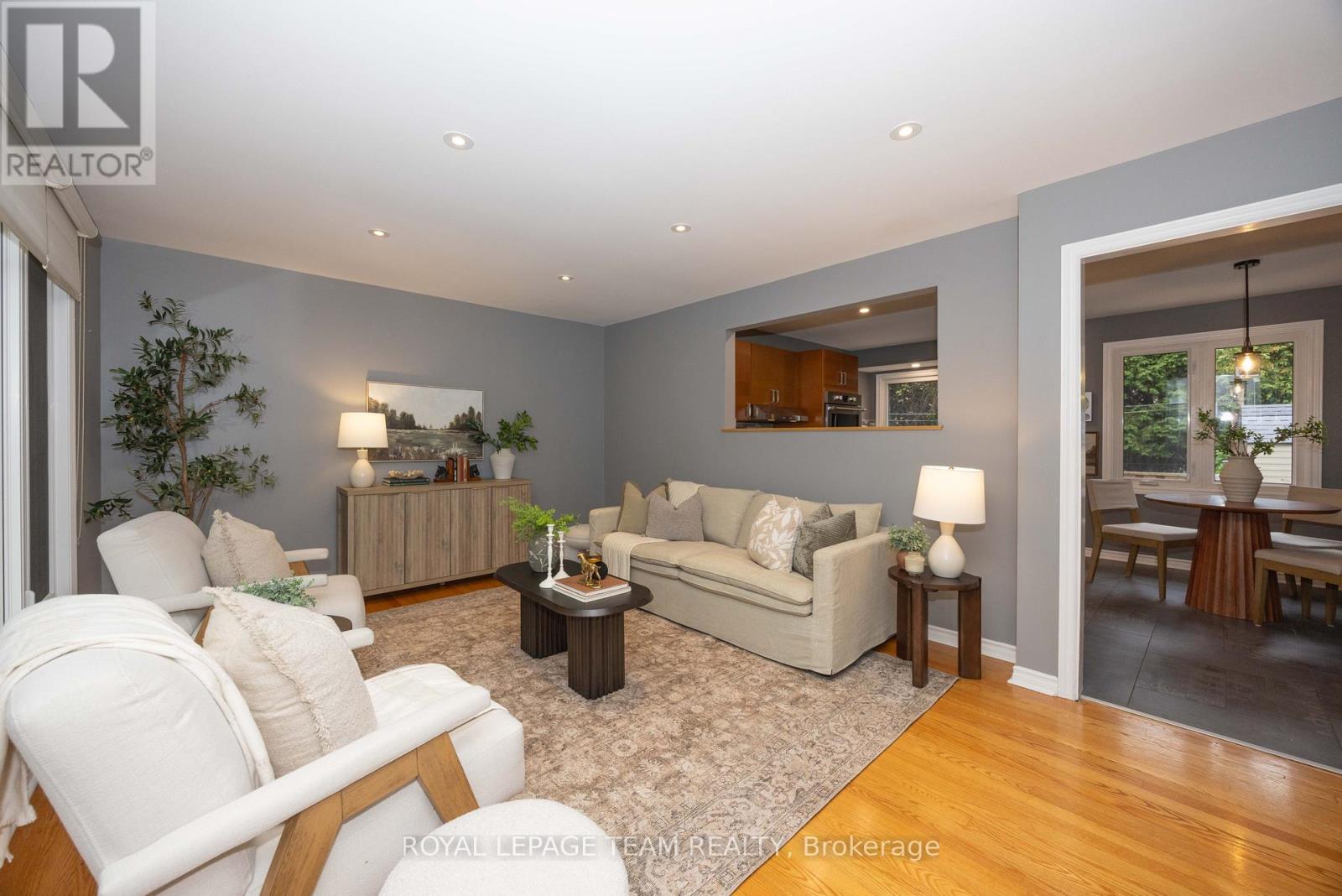 Rich hardwood flooring throughout the main level