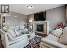 Family room - 50 Cimarron Grove Way, Okotoks, AB T1S2L9 Photo 12