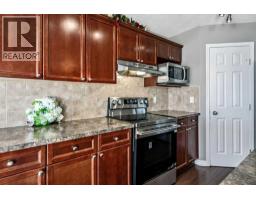 Bedroom - 50 Cimarron Grove Way, Okotoks, AB T1S2L9 Photo 9
