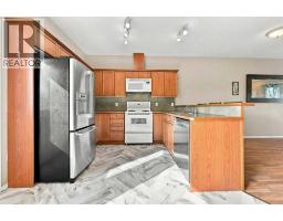 303, 2005 Luxstone Boulevard SW - photo 4