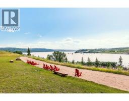 407 Cottageclub Grove, Rural Rocky View County, AB T4C1B1 Photo 33
