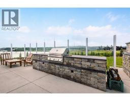 407 Cottageclub Grove, Rural Rocky View County, AB T4C1B1 Photo 30