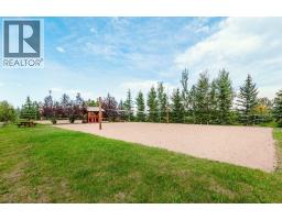 407 Cottageclub Grove, Rural Rocky View County, AB T4C1B1 Photo 34