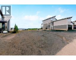 407 Cottageclub Grove, Rural Rocky View County, AB T4C1B1 Photo 38