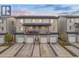 202, 135 Redstone Walk NE - photo 1