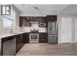 202, 135 Redstone Walk NE - photo 5
