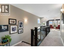 Den - 202 Boulder Creek Court Se, Langdon, AB T0J1X3 Photo 12