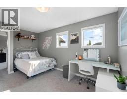 Primary Bedroom - 202 Boulder Creek Court Se, Langdon, AB T0J1X3 Photo 15