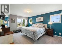 Bedroom - 202 Boulder Creek Court Se, Langdon, AB T0J1X3 Photo 19
