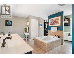202 Boulder Creek Court Se, Langdon, AB T0J1X3 Photo 24