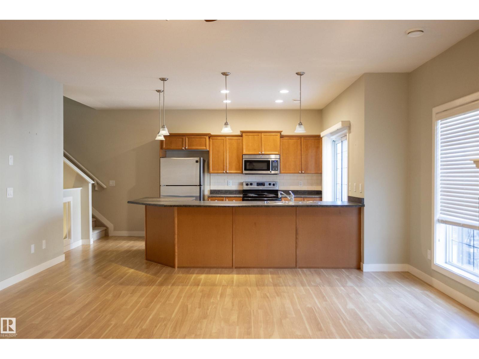 #25 7293 SOUTH TERWILLEGAR DR NW - Image 7
