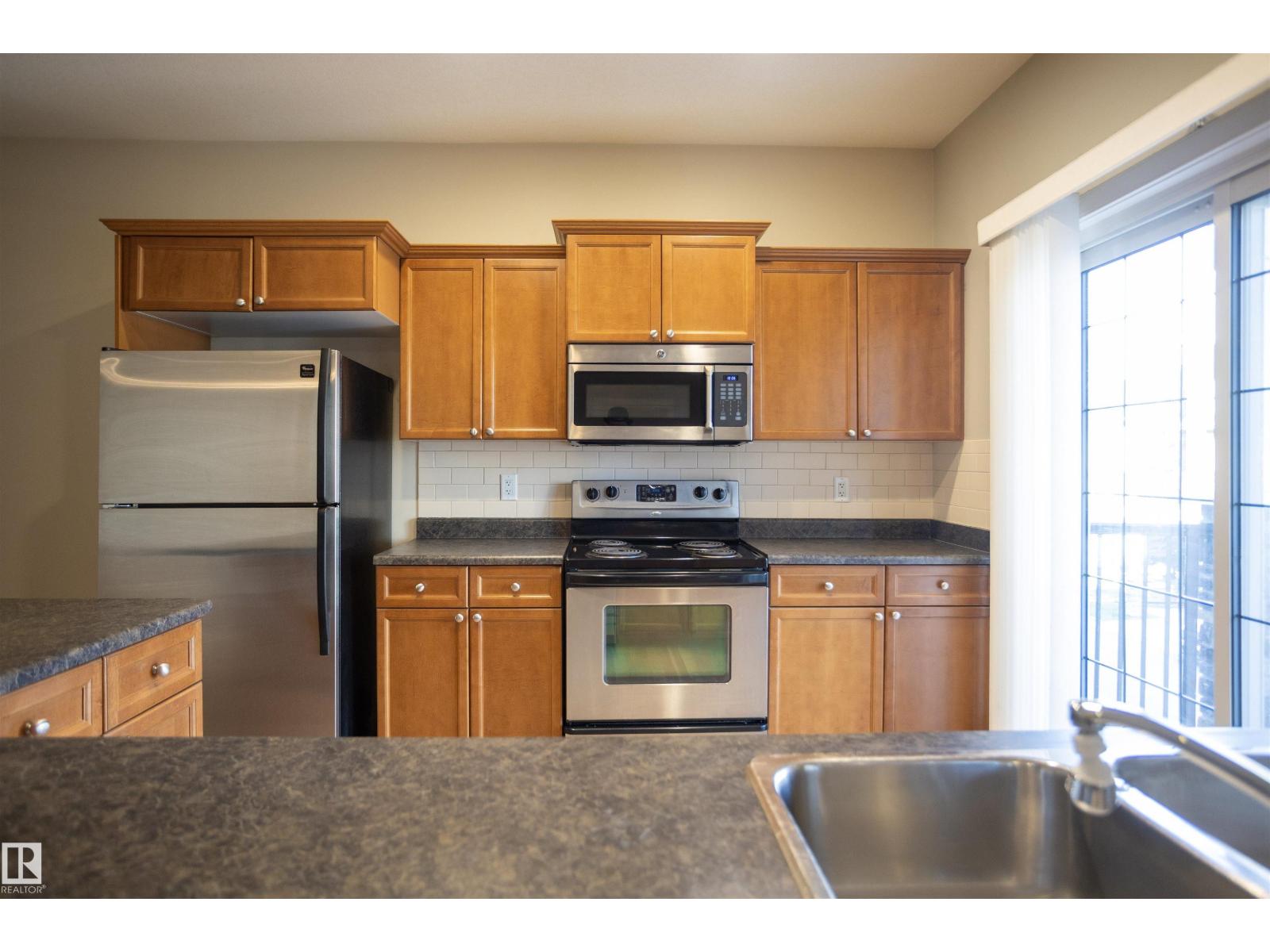 #25 7293 SOUTH TERWILLEGAR DR NW - Image 9