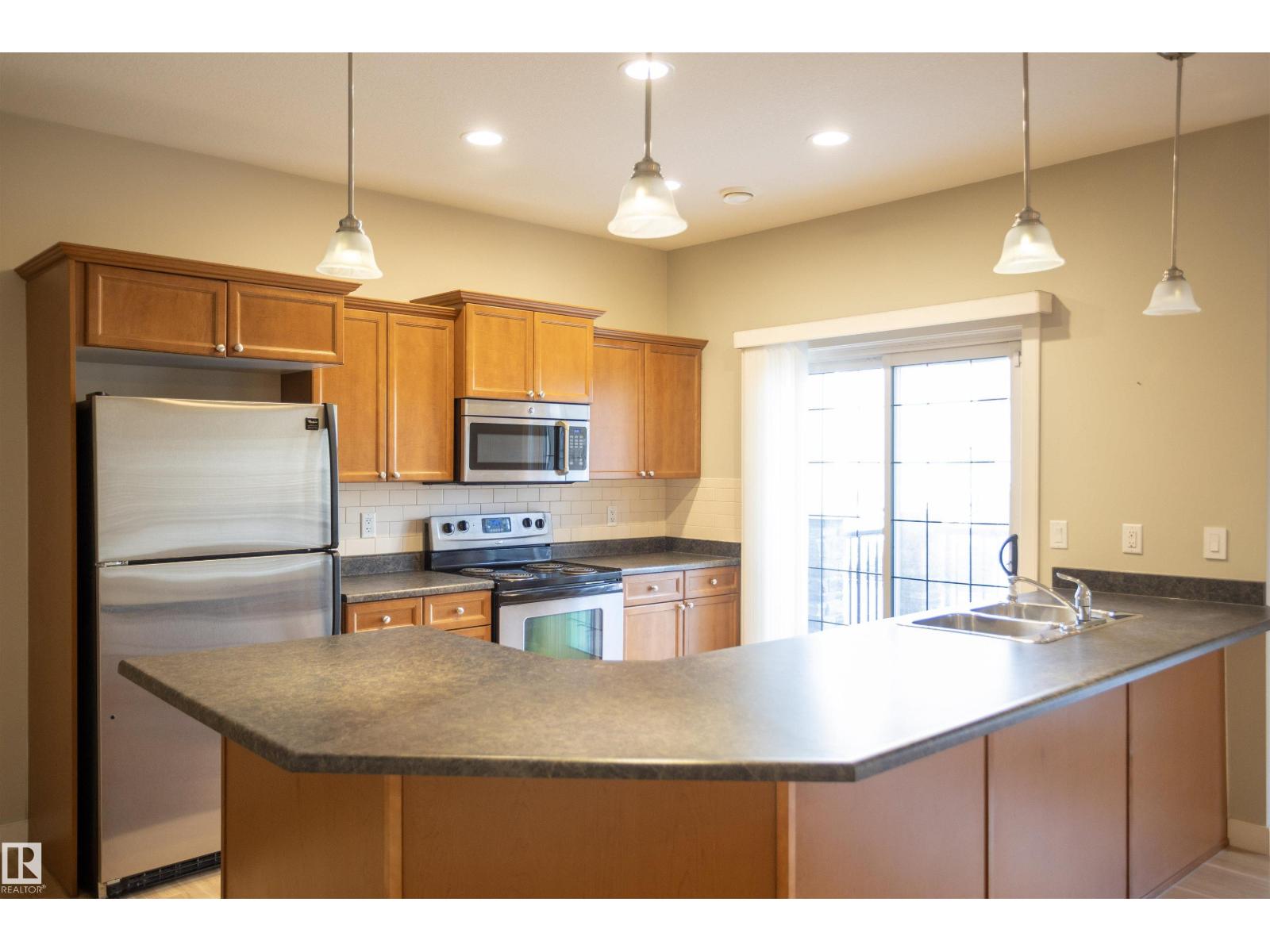 #25 7293 SOUTH TERWILLEGAR DR NW - 8