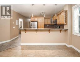 Living room - 102, 110 12 Avenue Ne, Calgary, AB T2E0Z9 Photo 7
