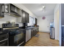 Family room - 704 75 Avenue Sw, Calgary, AB T2V0S3 Photo 8