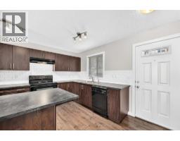 Bedroom - 152 Pantego Lane Nw, Calgary, AB T3K0T1 Photo 10