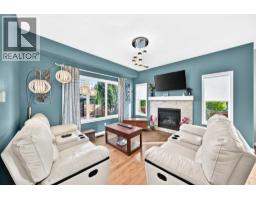 Family room - 68 Belgian Street, Cochrane, AB T4C0M3 Photo 12