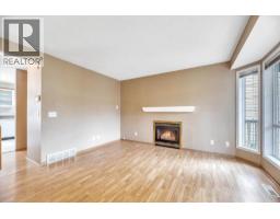 Living room - 131 Hidden Way Nw, Calgary, AB T3A5S7 Photo 10