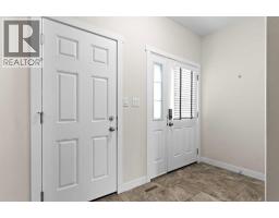 Family room - 107 Henderson Crescent, Penhold, AB T0M1R0 Photo 11