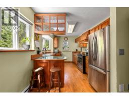 Kitchen - 4530 Thompson Clarke Dr E, Bowser, BC V0R1G0 Photo 11