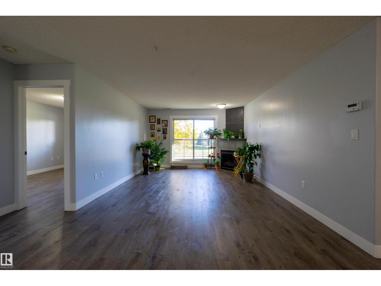 #128 – 279 Suder Greens Drive NW, Breckenridge Greens — photo 5 of 30: Property photo