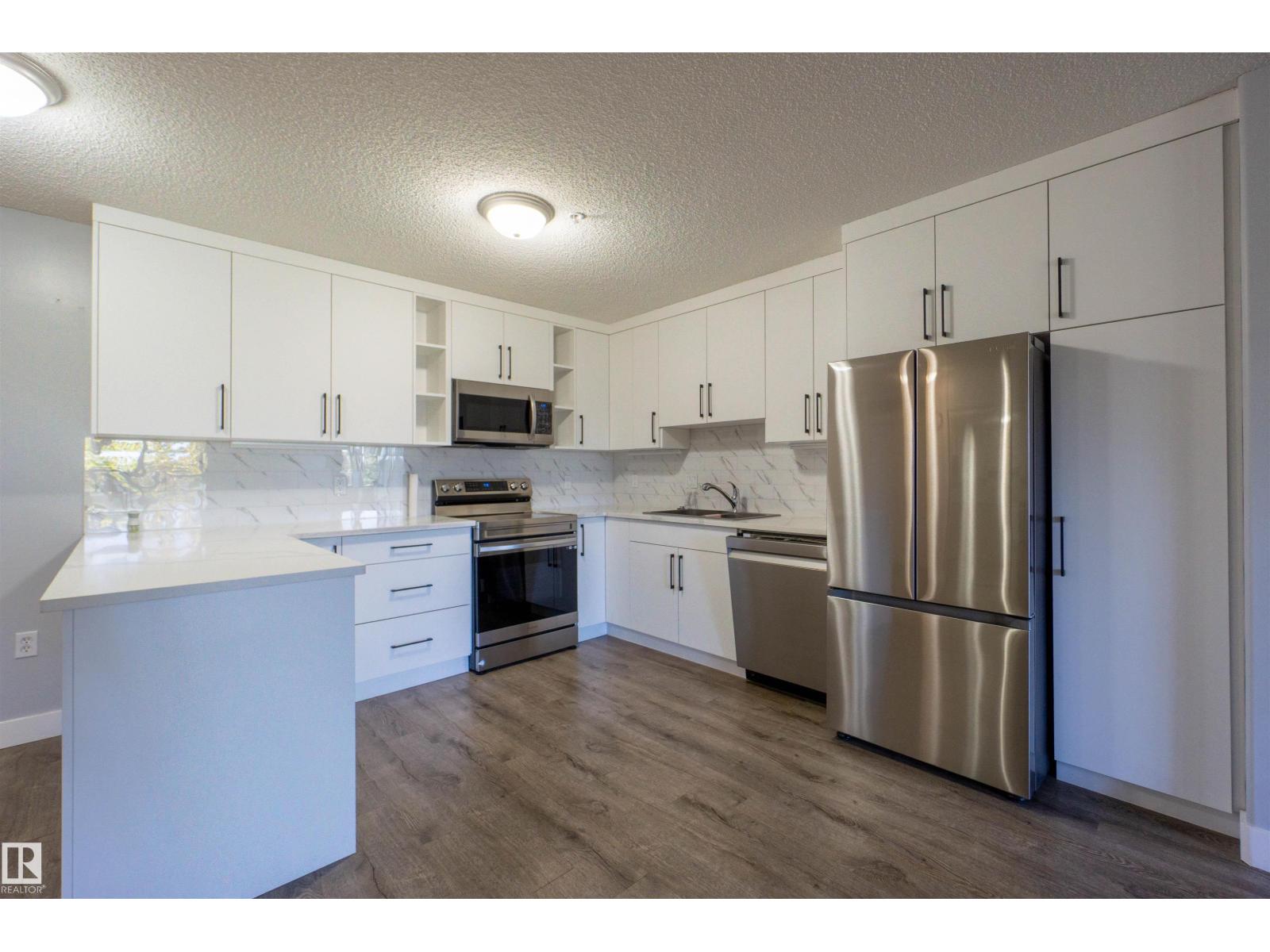 #128 – 279 Suder Greens Drive NW, Breckenridge Greens — photo 12 of 30: Property photo