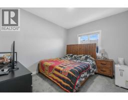 Laundry room - 58 Creekside Avenue Sw, Calgary, AB T2X4A9 Photo 22