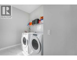 Foyer - 58 Creekside Avenue Sw, Calgary, AB T2X4A9 Photo 24