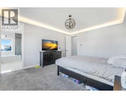 Family room - 58 Creekside Avenue Sw, Calgary, AB T2X4A9 Photo 30