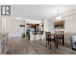 Living room - 1423, 81 Legacy Boulevard Se, Calgary, AB T2X2B9 Photo 7
