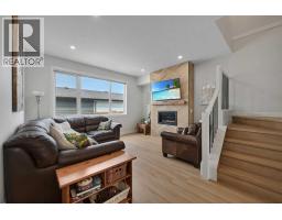 Family room - 858 Harmony Parade, Rural Rocky View County, AB T3Z0H9 Photo 13