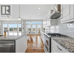 Laundry room - 127 Marquis Grove Se, Calgary, AB T3M1M6 Photo 16