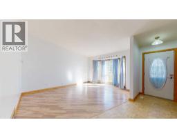 Living room - 3818 61a Street, Stettler, AB T4K1G4 Photo 6