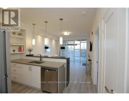 101 - 10 Concord Place, Grimsby, ON L3M0G6 Photo 6