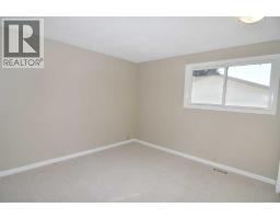 Family room - 248 Bracewood Road Sw, Calgary, AB T2W3C1 Photo 11