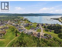 419 Cottageclub Cove, Rural Rocky View County, AB T4C1B4 Photo 35