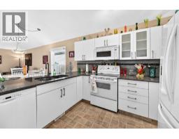 Laundry room - 84 Tuscany Valley Drive Nw, Calgary, AB T3L2E7 Photo 9
