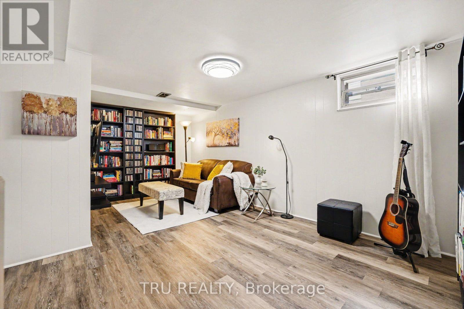 Finished lower level with electric fireplace