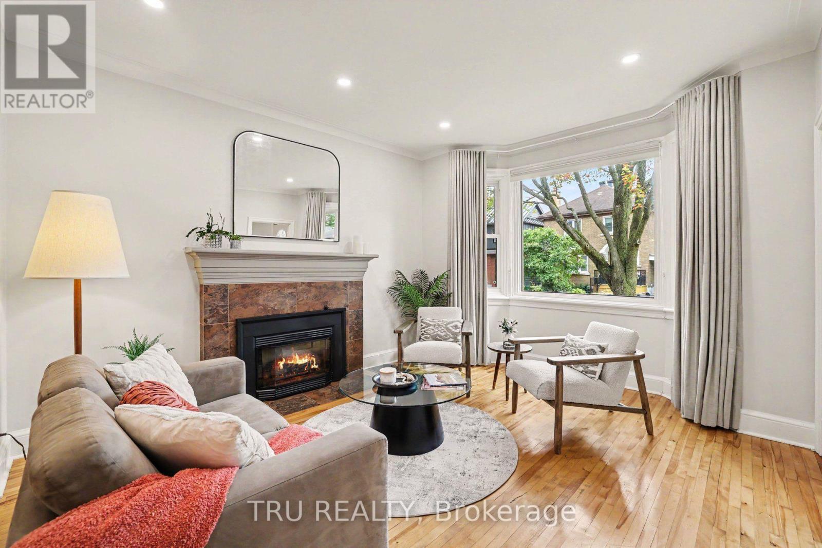 Bright inviting living room with large bay window