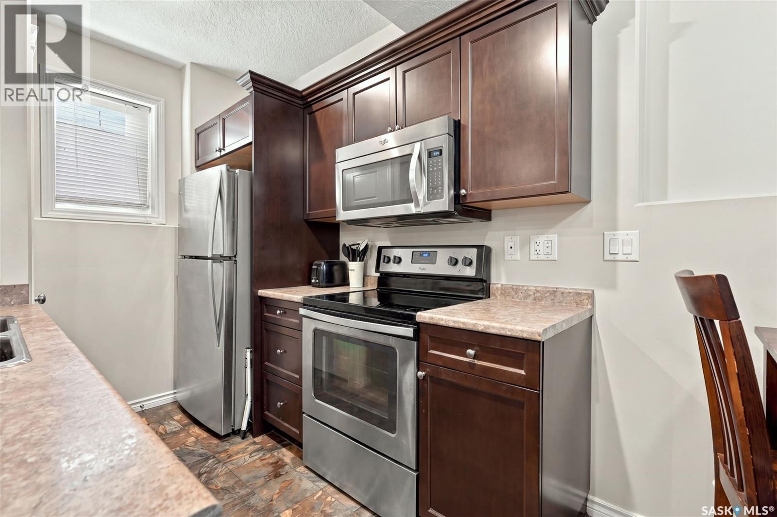 919 Kolynchuk BEND, Saskatoon — photo 34