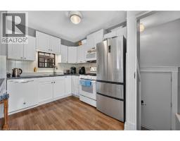 Living room - 208 Carlton Street, St  Catharines, ON L2R1S6 Photo 6