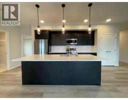 2304, 42 Cranbrook Gardens SE - photo 1