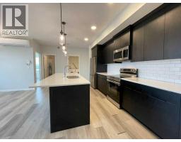 2304, 42 Cranbrook Gardens SE - photo 4
