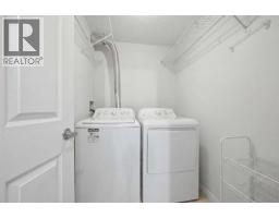 Living room - 111, 5555 Falsbridge Drive Ne, Calgary, AB T3J3E8 Photo 6