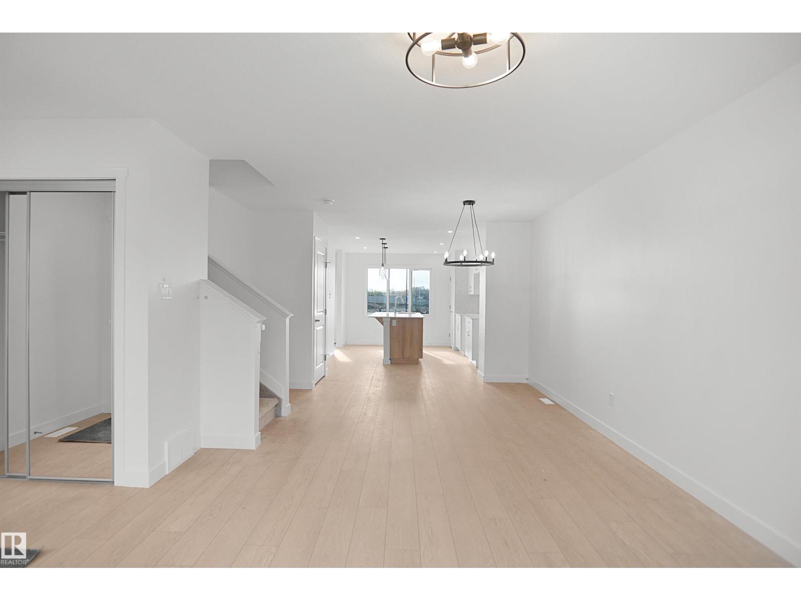 21139 25 Avenue NW, The Uplands — photo 5 of 28: Property photo