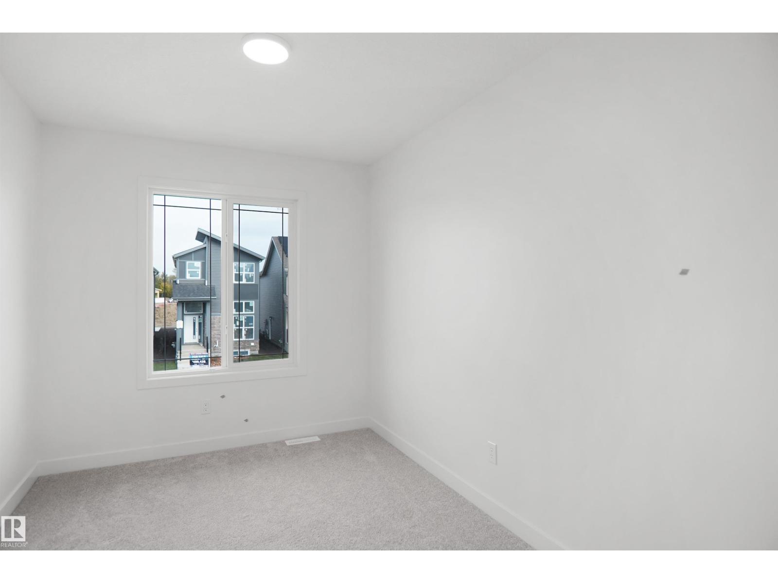 21139 25 Avenue NW, The Uplands — photo 24 of 28: Property photo