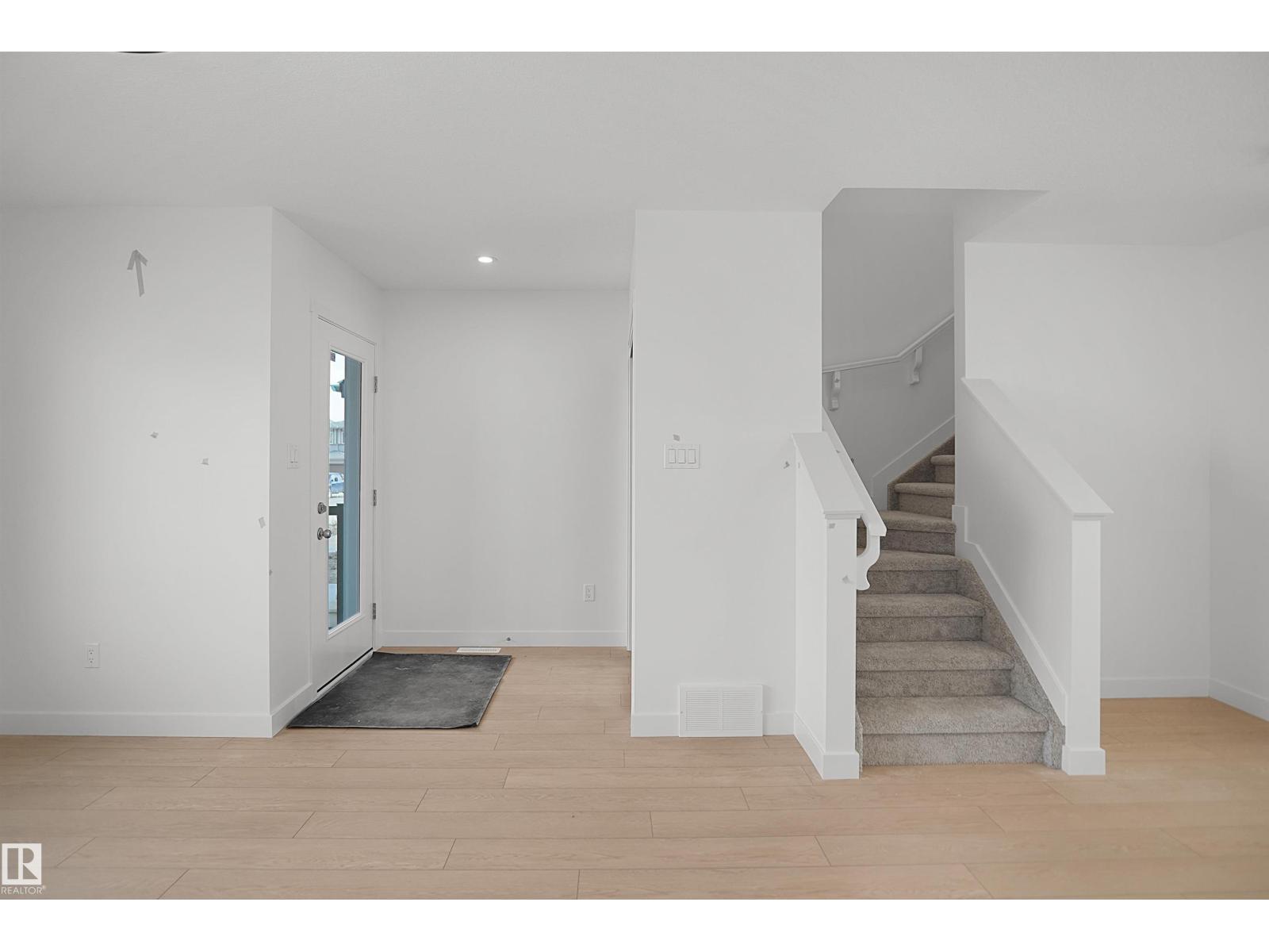 21139 25 Avenue NW, The Uplands — photo 7 of 28: Property photo