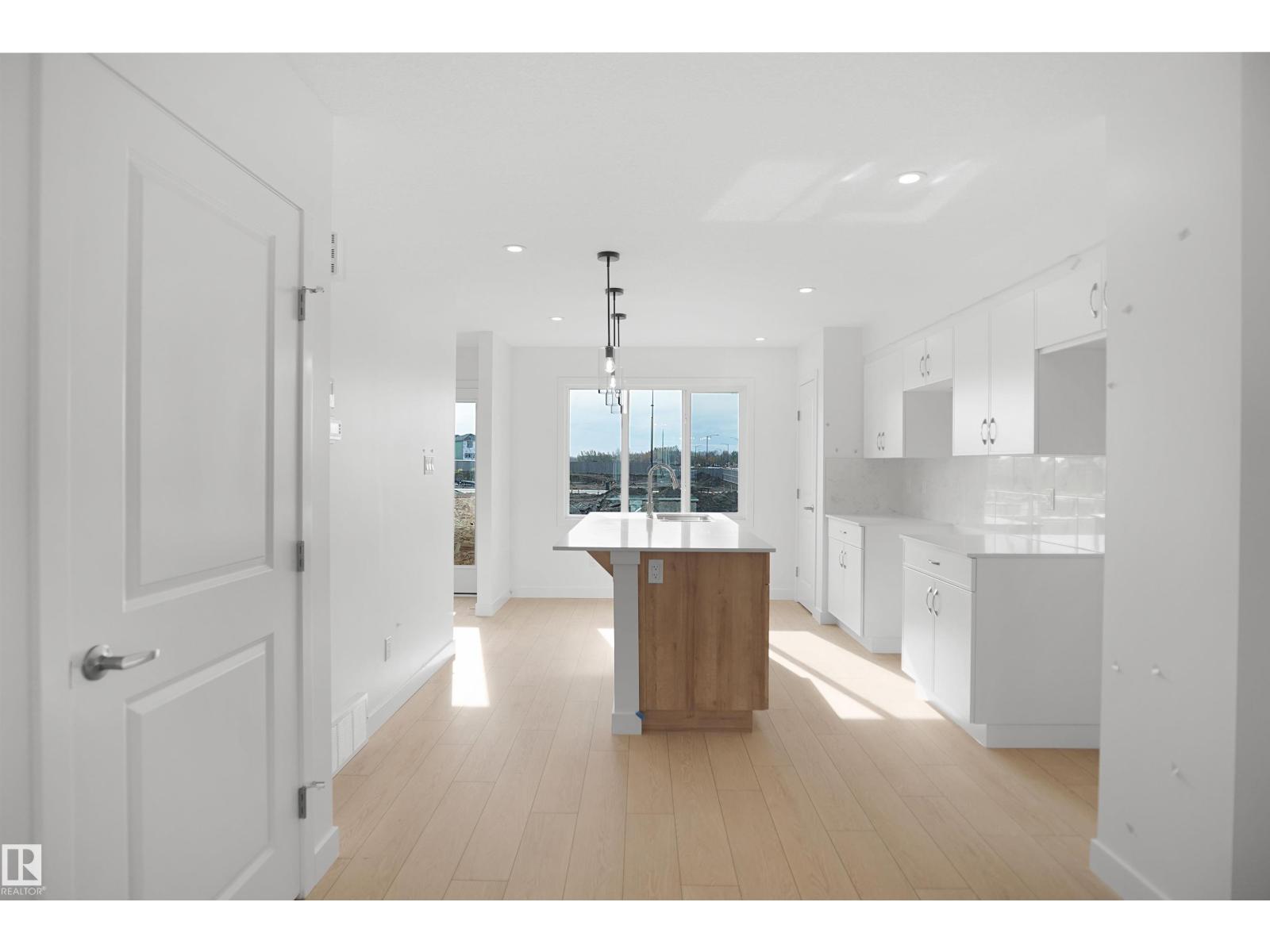 21139 25 Avenue NW, The Uplands — photo 11 of 28: Property photo