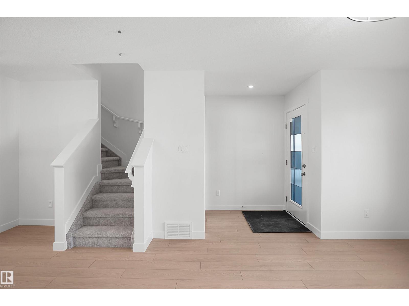 21219 25 Avenue NW, The Uplands — photo 6 of 25: Property photo