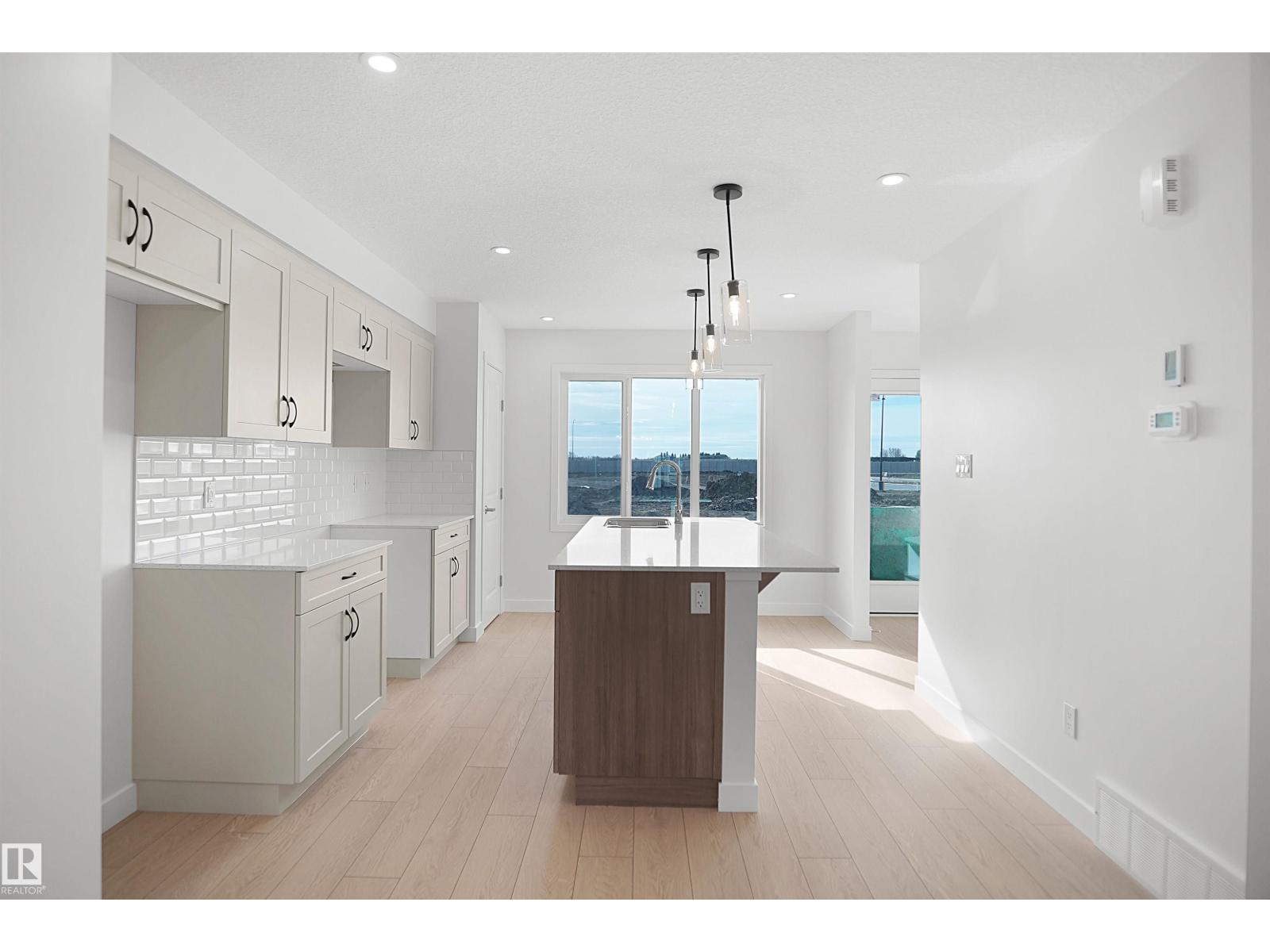 21219 25 Avenue NW, The Uplands — photo 9 of 25: Property photo